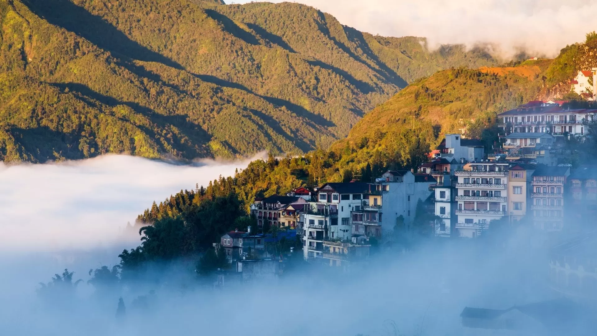 Sapa valley city in the mist in the morning