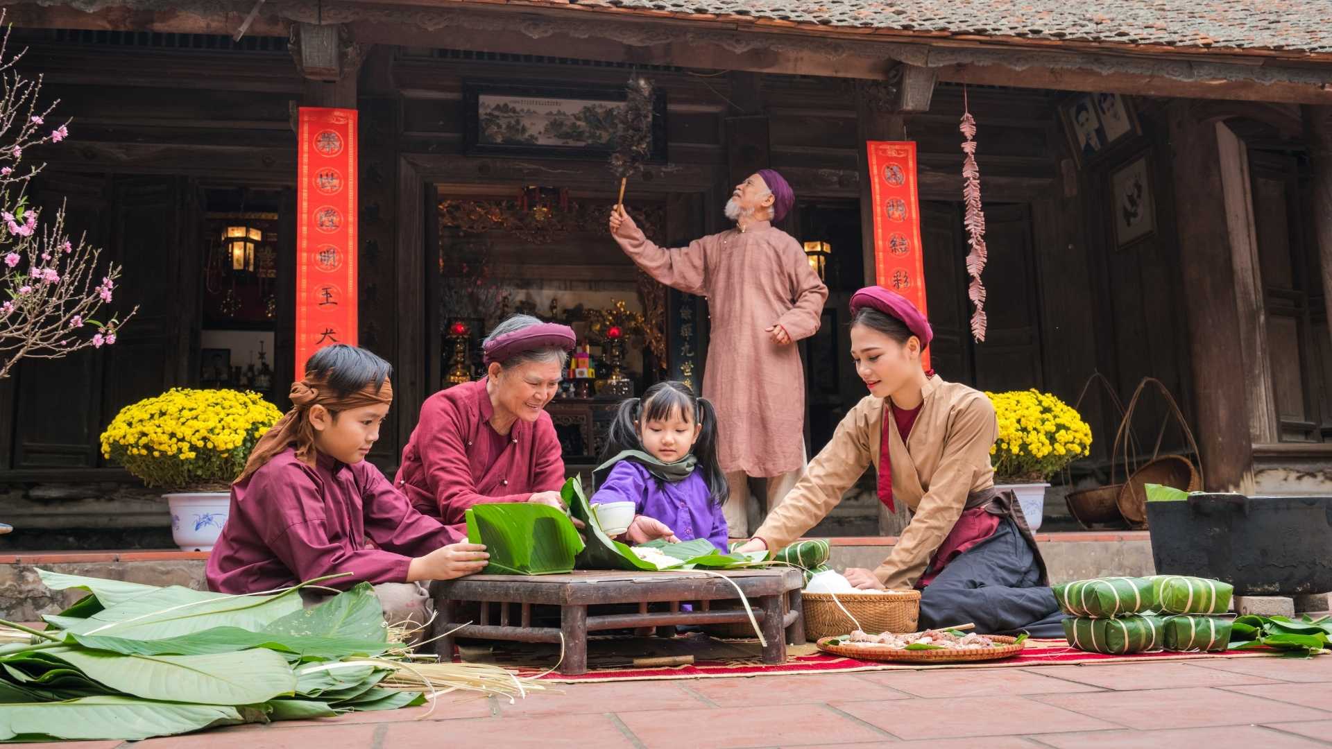 Vietnamese people preparing for Tet holiday